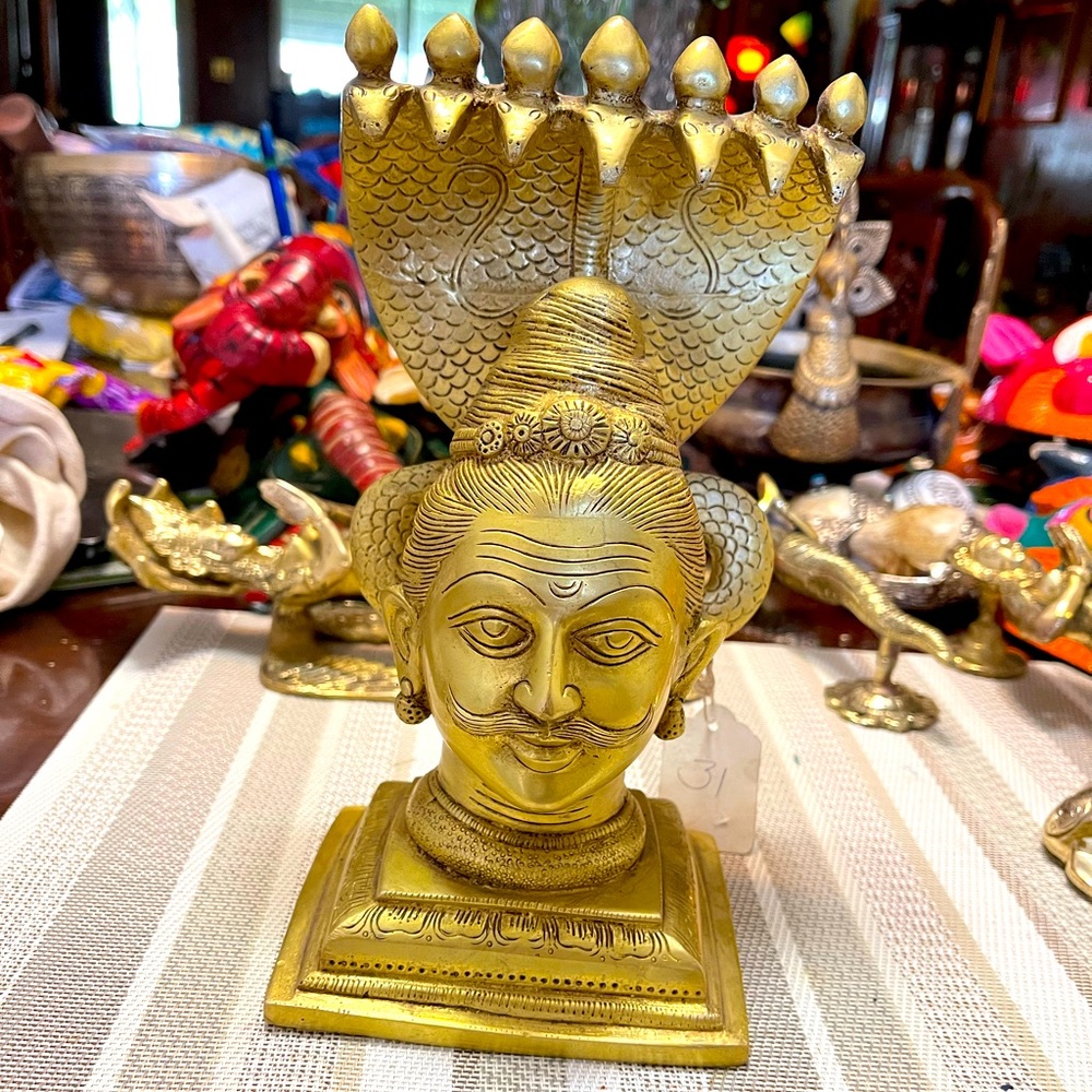 Beautiful brass Lord shiva head statue with snack